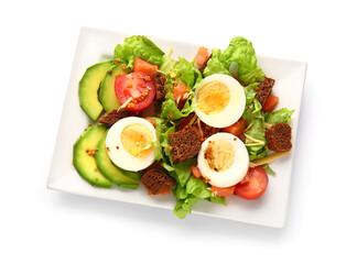 Plate of delicious salad with boiled eggs and salmon isolated on white background