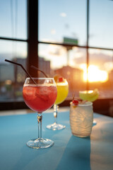 set of color alcohol stylish cocktails in bar or restaurant, green, red, yellow