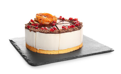 Slate board with tasty birds milk cake on white background