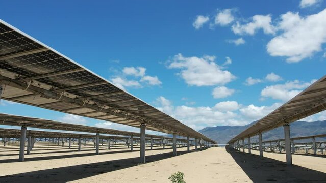View of solar panels with bifacial technology and tracker from drone never before seen footage with gimbal extender range