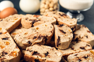 Delicious biscotti cookies on black background, closeup