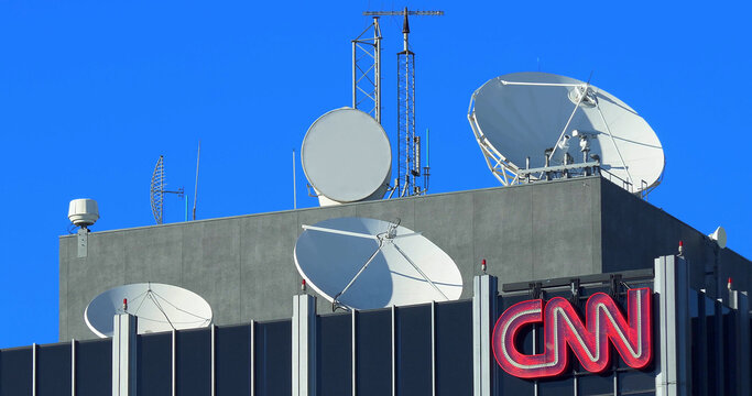 CNN communication broadcast tower on Sunset Boulevard and satellite antennas broadcasting latest breaking news on February 6, 2022 in Los Angeles, California