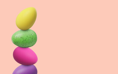 Stack of bright Easter eggs on pink beige background, space for text