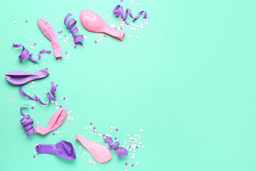 Pink and purple balloons with serpentine, ribbons on blue background