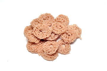 Raw crackers before being fried are made from tapioca flour and spices