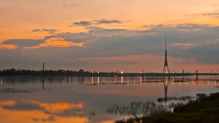 Fototapeta na wymiar evening landscape, the photo shows a sunset on the Daugava river