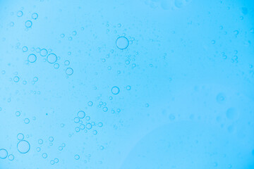 Air bubbles in the water background.Abstract oxygen bubbles in the sea.Water bubbles isolate on blue background.Air bubble floating up to top of water surface which little and big circle shape.