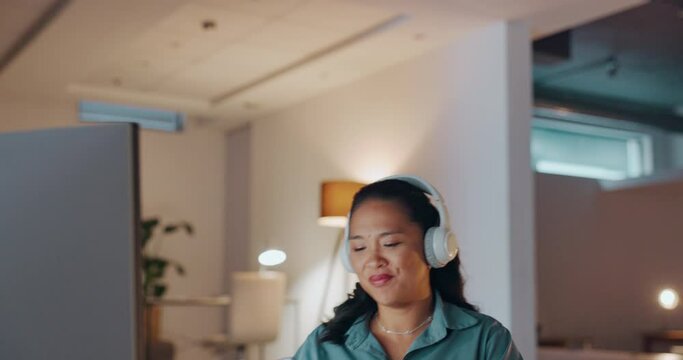 Woman, music and dance in night office with happiness, motivation and excited mindset of late shift. Happy worker dancing with headphones, mobile and evening of business success, inspiration or smile