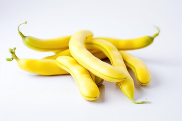 Closeup of Yellow Beans on a white background. Created by Generative AI technology.