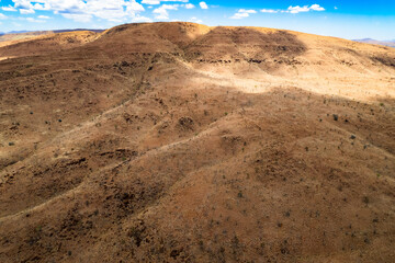 Looking down on an arid barren mountain scape in the remote Australian outback