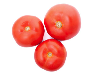 Three fresh tomatoes isolated over white background. Diet and healthy nutrition