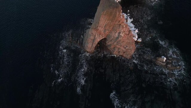 Cinematic drone shot of famous Perce rock in Quebec, Canada