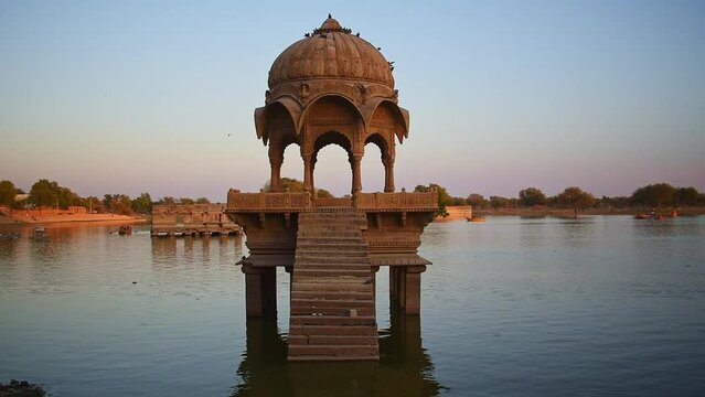Scenic view of a cenotaph built in the middle of Gadisar lake in Jaisalmer. A famous tourist attraction