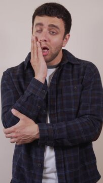 Vertical video.white man,angry and disillusioned for a cause.thoughtful and reflective.
