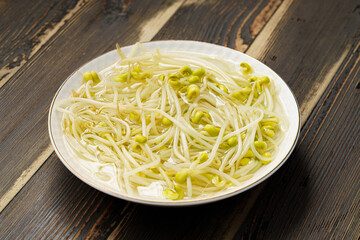 Boiled bean sprouts on a monochrome background