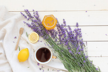 Honey and lavender bouquets. Virus treatment concept. Black coffee on a wooden table.