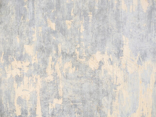 decorative ornament of peeling yellow wall paint background