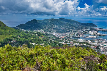 Fototapeta na wymiar Copolia trail view of the international port and domestic port of Seychelles, cruise ship Silver shadow docked at the port 2