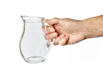 Men's hand holding glass water jug isolated on white background. Space for text, for advertising