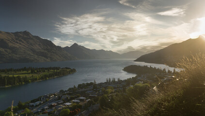 Queenstown, New Zealand at sunset overlooking the lake and montains