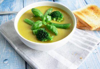 
Soup with broccoli and vegetables. Delicious, diet. And with toast