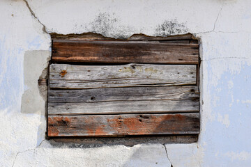 Boarded window background on an old white wall, frame, graphic resource