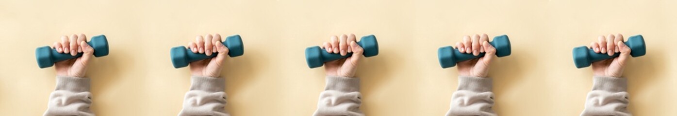 A close-up image are many hands and arm of a woman lifting dumbbells, Active and healthy lifestyle, Banner