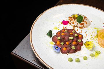 delicious carpaccio on a plate in a restaurant
