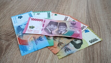 New series of Indonesian money rupiah denomination hundred , fifty, twenty, five and one thousand. Selective focus    