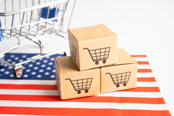 Box with shopping online cart logo and USA America flag, Import Export Shopping online or commerce...