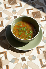 Bowl of soup with vegetable and beef