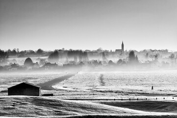 Foggy morning on salt fields of Bricqueville-sur-Mer village 