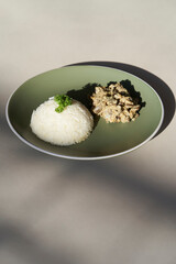 Rice and stew with mushrooms, background with copy space