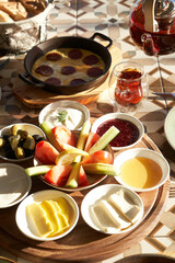 Breakfast buffet table with assorted food and drinks