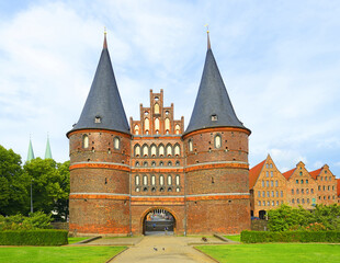Fototapeta na wymiar The Holsten Gate (German: Holstentor) in Luebeck, Germany. It is the most significant gate of the Middle Ages in Germany. It was constructed from 1464-1478 as a town gate. UNESCO World Heritage Site