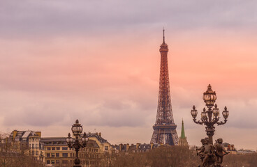 Fototapeta na wymiar Sunset from the Alexandre III bridge with the Eiffel Tower in the background, Paris, France