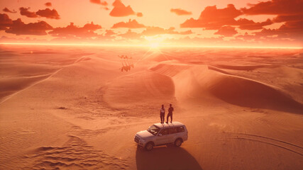 Aerial. Young travellers stands on the car roof and looks on the camels group on the sunset