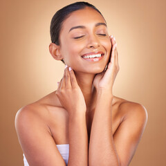 Beauty, skincare and touch with indian woman in studio for happy, spa treatment and facial....
