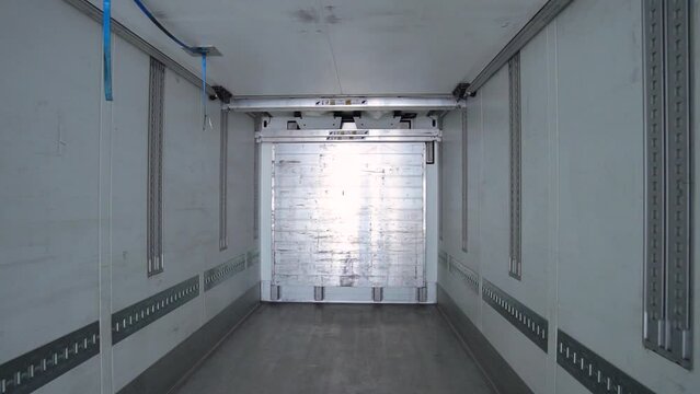 Empty semi trailer, perspective view, dolly zoom shot. Logistics and freight background