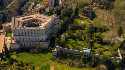 Aerial view of Villa Farnese and its gardens located in Caprarola, near Viterbo, Italy. It is a...
