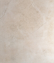 Textured, warm toned, natural marble stone surface and background	