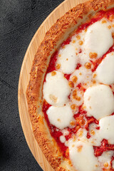 Closeup on gourmet italian margherita pizza with cheese