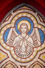 Fototapeta na wymiar St Paul's catholic church, Belfast, Northern Ireland. Symbol of evangelist St Matthew. Ulster, U.K.