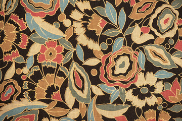 Old floral fabric pattern background.