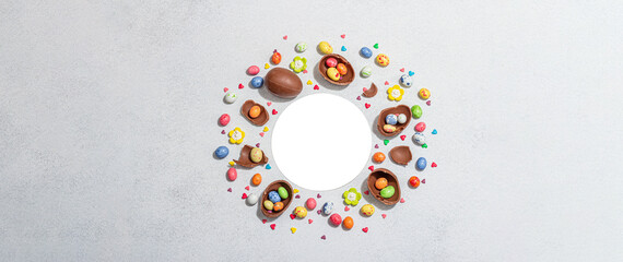 Traditional Easter sweets with eggs, chocolate rabbit, festive edible decor. Children's quest