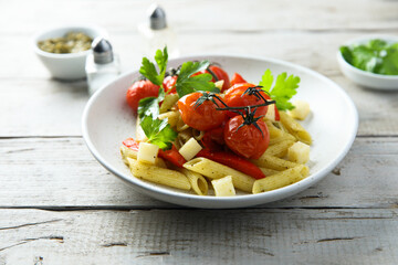 Pasta with baked tomatoes and cheese