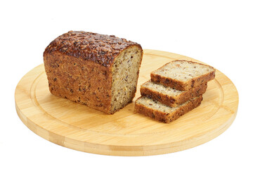 Bread made of wheat flour with seeds cut into slices on a wooden board on a white background