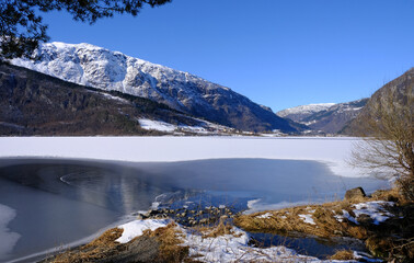 Granvin Lake and mountains in Winter, Granvin, Norway