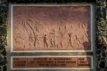 Relief commemorating the arrival of catholic missionaries in Grand Bassam, Ivory Coast.