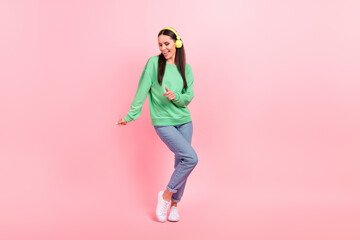 Fototapeta na wymiar Photo of overjoyed positive lovely lady wear stylish clothes enjoy free time relax rest have fun isolated on pink color background